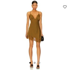 x REVOLVE Nouvelle Mini Dress in Olive Green
House of Harlow 1960